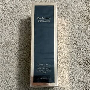 RE-NUTRIV
ULTIMATE DIAMOND TRANSFORMATIVE BRILLIANCE SERUM 1FL OZ
